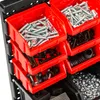 A close-up view of a storage organizer with red bins filled with various fasteners. Anteprima dell’immagine prodotto