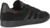 A side view of a black Adidas Gazelle sneaker. Voir les images du produit