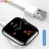 A close-up shot of an Apple Watch with a charging cable connected. Produktbild-Vorschau
