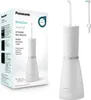 A product box and the oral irrigator it contains, displayed against a white background. Podgląd zdjęcia produktu