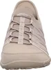 A close-up front view of a beige Skechers women's shoe. Náhled obrázku produktu