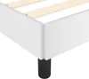 Close-up of a white bed frame with wooden slats and a black leg. Anteprima dell’immagine prodotto
