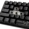 A close-up view of a mechanical keyboard with some keys removed, revealing the switches. Produktbild-Vorschau