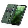 A green flip cover wallet case for a smartphone, open to reveal the phone screen and card slots. Produktbild-Vorschau
