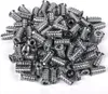 A pile of metal screw inserts. Produktbild-Vorschau
