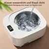 A white ultrasonic cleaner being filled with water, with text overlays in German. Produktbild-Vorschau