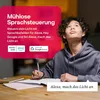 A young person is studying at a desk while looking up, with a marketing overlay promoting voice control for smart lights. Produktbild-Vorschau