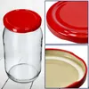 A collage of images showing a glass jar with a red lid, a close-up of the lid, and a close-up of the inside of the lid. Podgląd zdjęcia produktu