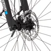 A close-up view of a bicycle's front wheel hub and disc brake. Produktbild-Vorschau