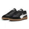 A pair of black Puma sneakers with white accents and a brown sole, shown from a slightly angled front view on a white background. Produktbild-Vorschau
