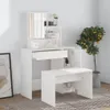 A white vanity table with a mirror and stool, set against a light gray wall with a potted plant to the side. Anteprima dell’immagine prodotto