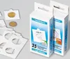 Two boxes of coin holders and loose coin holders with coins. Produktbild-Vorschau