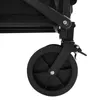 A close-up view of a black wheel and part of the frame of a wagon. Náhled obrázku produktu