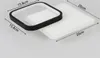 A black framed square light fixture and a white rectangular base are shown with dimensions indicated by arrows and text. Produktbild-Vorschau