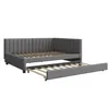 A gray upholstered daybed with a pull-out trundle bed, shown from a side angle against a white background. Náhľad obrázku produktu