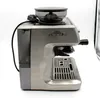 Side view of a silver espresso machine with a built-in grinder. Produktbild-Vorschau