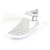 A white women's boot is shown on a white surface against a white background. Produktbild-Vorschau