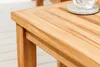 A close-up view of a wooden table. Produktbild-Vorschau