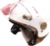 A white motorcycle helmet with brown trim and a clear visor. Podgląd zdjęcia produktu