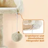 A close-up view of a beige cat tree, highlighting a dangling toy ball with a bell, with a magnified inset showing how it is attached. Produktbild-Vorschau
