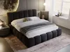 A modern bedroom with a large upholstered bed as the focal point, decorated with a moon-like wall art. Produktbild-Vorschau