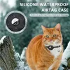 An orange cat wearing a collar with an Airtag case in a snowy outdoor setting. Produktbild-Vorschau