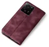 A burgundy flip cover phone case is shown from a diagonal top-down view on a white background. Produktbild-Vorschau