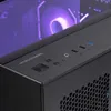 Close-up of the top and front panel of a black computer case, with a purple illuminated fan visible inside. Produktbild-Vorschau