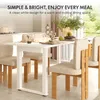 A dining table and chairs set in a bright, modern dining room setting. Anteprima dell’immagine prodotto