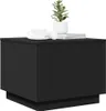 A black side table with a plant, a cup, and books on top. Produktbild-Vorschau