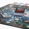 A close-up view of a Monopoly Banking Ultra board game set up on a table. Produktbild-Vorschau