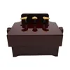 A piano pedal extender bank with three gold pedals on a dark brown wooden base, shown from a front-facing angle against a white background. Náhled obrázku produktu