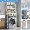 A bathroom shelf unit installed above a washing machine, showcasing storage and accessories. Produktbild-Vorschau