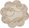 A close-up, top-down view of a single, beige, flower-shaped adhesive breast lift tape with a subtle patterned design. Náhled obrázku produktu