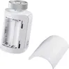 A white smart home radiator thermostat with its battery compartment open and a detached cover next to it, set against a white background. Produktbild-Vorschau