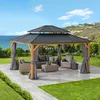 A gazebo with outdoor furniture set up on a patio, with a view of the ocean and hills in the background. Produktbild-Vorschau
