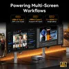 A desk setup with multiple monitors, a mini PC, and cables, showcasing multi-screen workflows. Produktbild-Vorschau