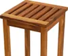 A close-up view of a wooden stool. Náhled obrázku produktu