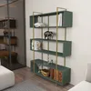 A green and gold bookshelf is displayed against a white wall, with a reflection of another room in a mirrored surface to the left. Produktbild-Vorschau
