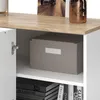 A close-up view of an open white cabinet with a wooden top, revealing a gray storage box on a shelf and books on a lower shelf. Náhled obrázku produktu