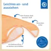 Close-up of an orange baby bib with text annotations highlighting its features. Produktbild-Vorschau