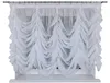 A white sheer curtain is hung on a window. Produktbild-Vorschau