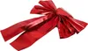 A large red metallic bow with streamers, isolated on a white background. Náhled obrázku produktu