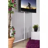 A white cable channel is shown running vertically down a wall, concealing cables from a wall-mounted television. A potted plant and a small side table with a plant and rug are also visible. Podgląd zdjęcia produktu