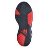 The sole of a black Adidas basketball shoe with red accents. Podgląd zdjęcia produktu