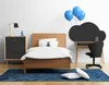 A child's bedroom with a bed, desk, and dresser. Produktbild-Vorschau