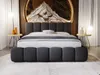 A bedroom scene featuring a large upholstered bed. Produktbild-Vorschau