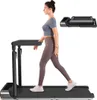 A woman is walking on a treadmill, with a folded treadmill shown in the background. Produktbild-Vorschau