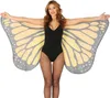 A woman wearing a black leotard and fishnet stockings is posing with large butterfly wings. Anteprima dell’immagine prodotto