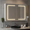 A bathroom vanity with a lighted medicine cabinet above a sink. Produktbild-Vorschau